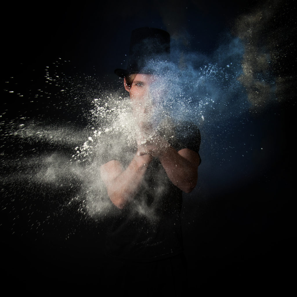Young Magician playing with Magic Powder
